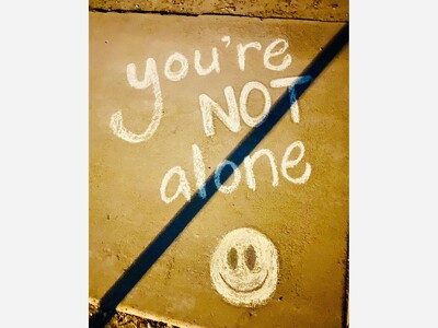 Inspiration in Chalk in Chihuahuita as Mayor Pro Tem Sharon McDonald and Artist Taylor Ojeda Partner in Kindness