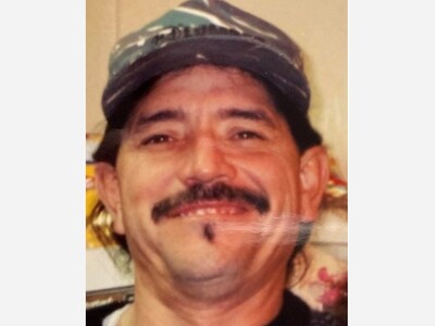 In Loving Memory of Godfrey Alex Brusuelas